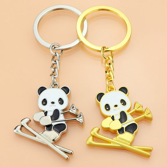 National Treasure Panda Ski Pendant Key Chain-Gifts-Elevate your style with our ski panda keychain in gold or silver. The perfect accessory for ski enthusiasts.-okidokibro
