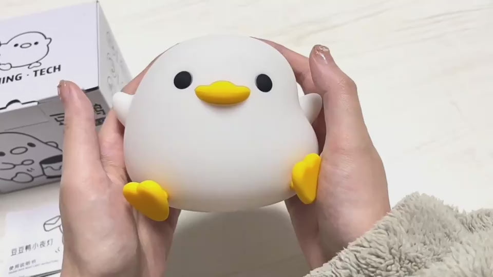 Doudou Duck Night Lamp a video of someone playing with it 